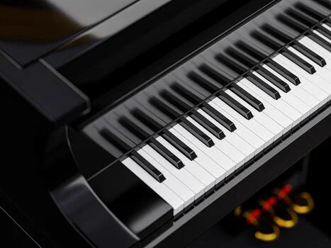 Teclado de un piano de cola negro laqueado